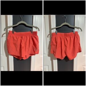 Nike coral running shorts
